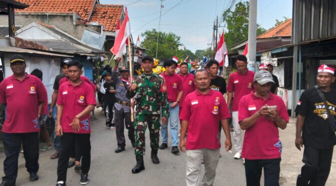 Koramil 0620-19/Arjawinangun Laksanakan Pengamanan Kegiatan Arak-arakan dan Lomba Tradisional di Desa Karanganyar